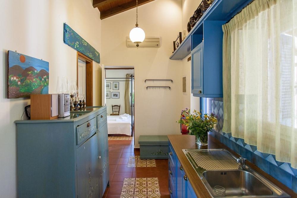 Dine on the Generous Veranda at a Rustic Stone Getaway