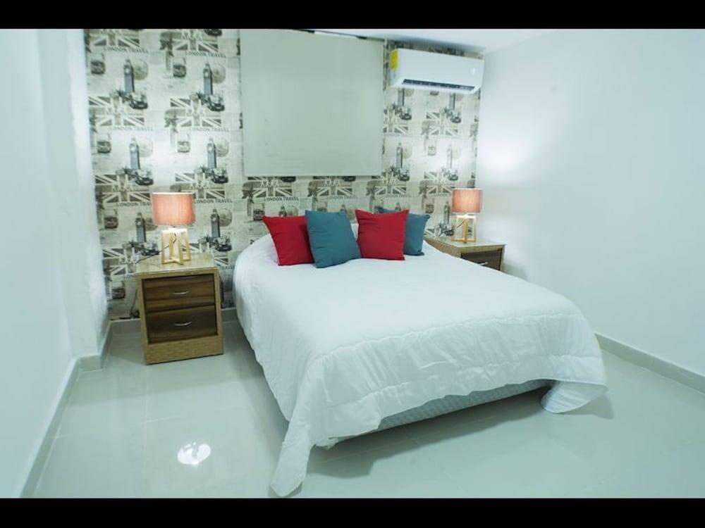 Room in Condo - Malecon Premium Rooms