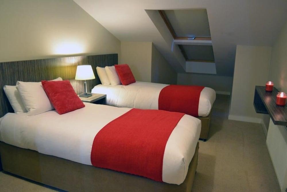 Carrick Plaza Suites & Apartments