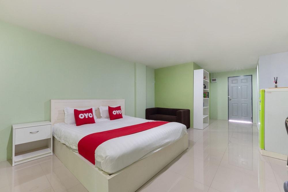 OYO 75363 V Place Apartment