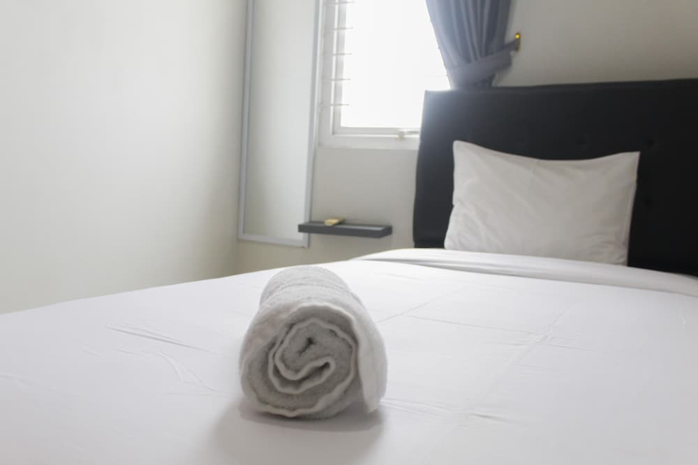 Comfort and Stylish 2BR at Grand Palace Kemayoran Apartment