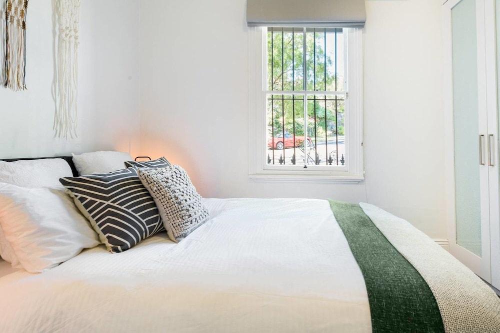 Historic 1890s House With Terraced Backyard Deck