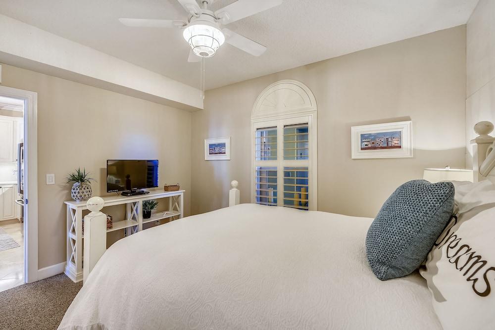 Tropic Winds by Book That Condo