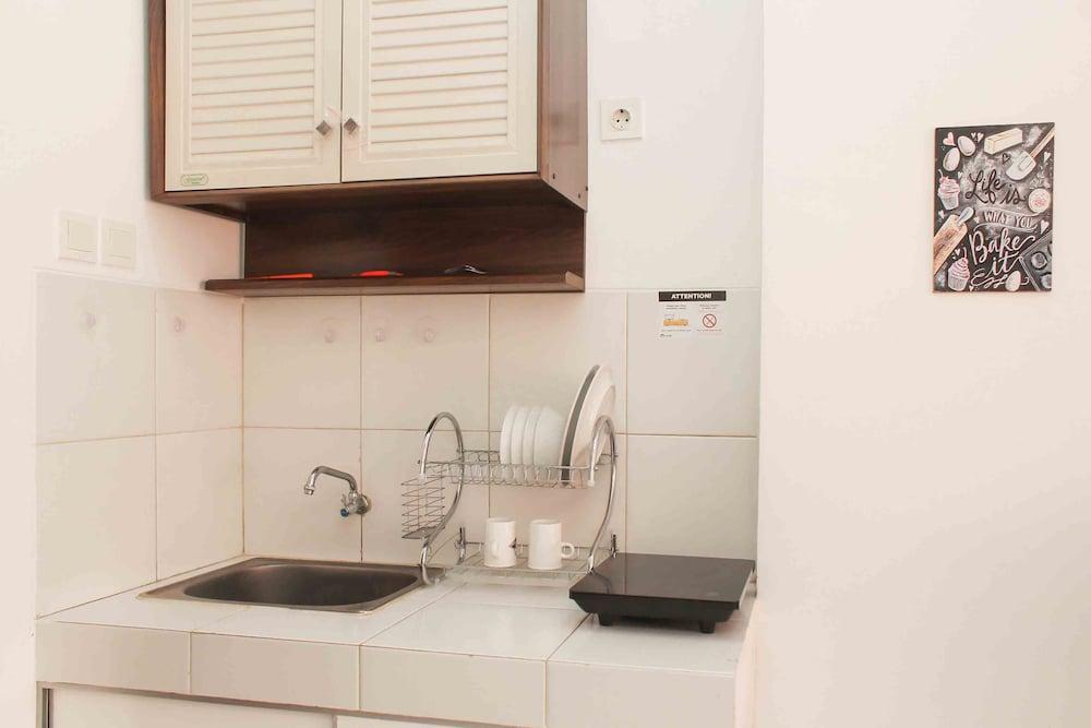 Chic and Cozy Studio at Riverview Jababeka Apartment