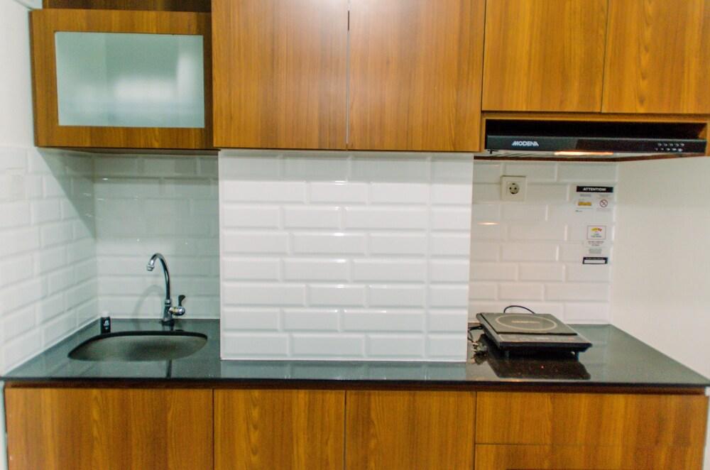 Unique Studio With Folded Bed Amazana Serpong Apartment