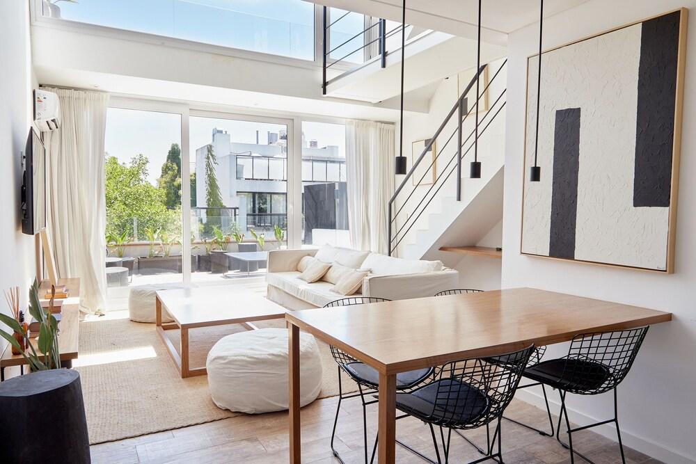 Unique triplex with rooftop private use