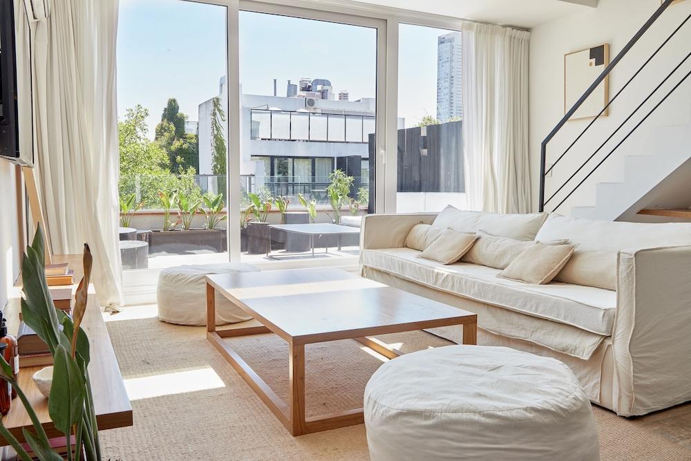 Unique triplex with rooftop private use