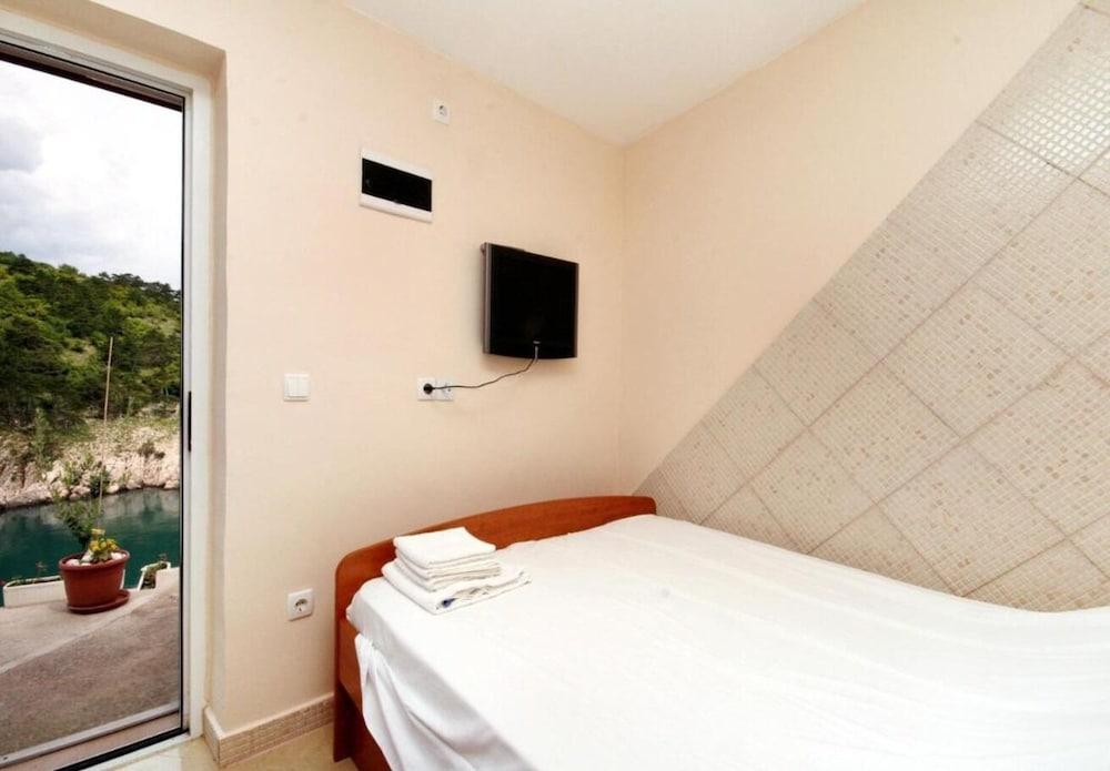 Bernardica - on Cliffs Above sea - H