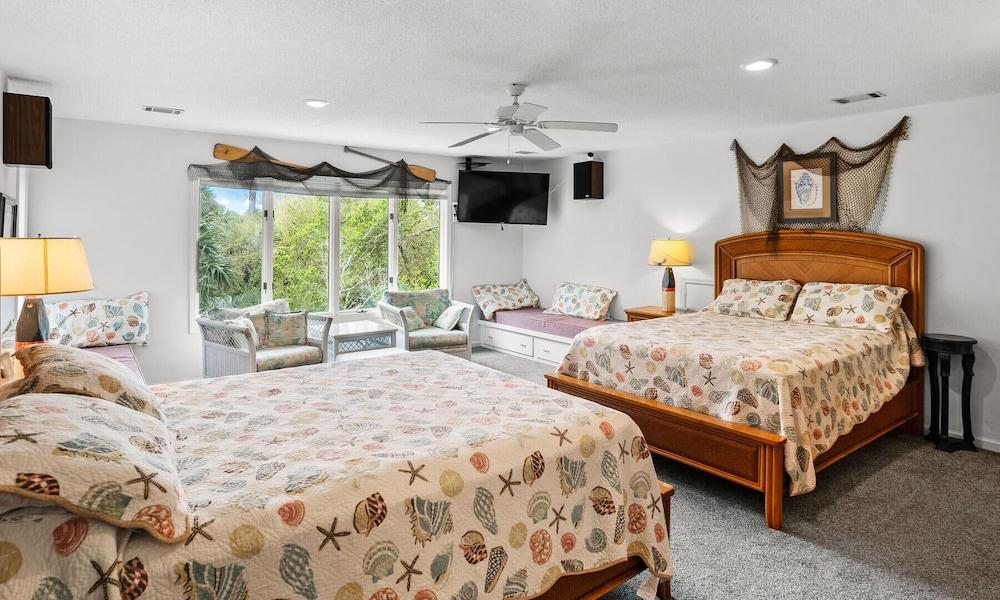 Sprawling Family Home Near Beaches With Fishing Dock & Beautiful Canal Views