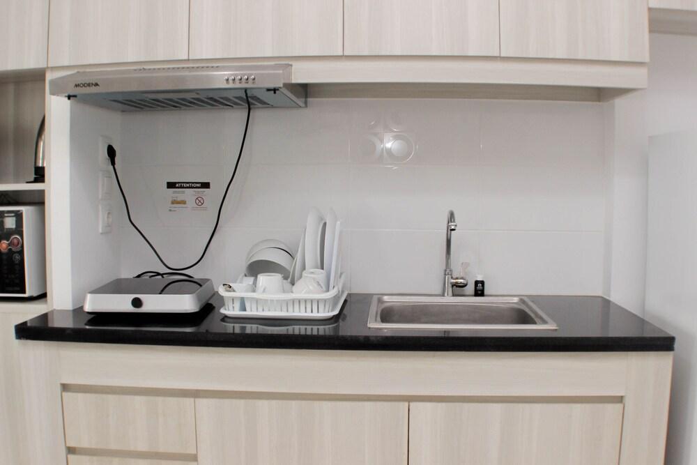 Comfy And Spacious Studio Azalea Suites Apartment