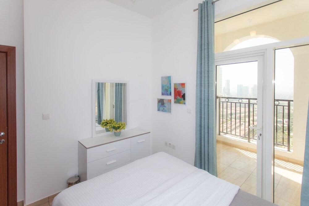 Stylish flat aerial view & pool