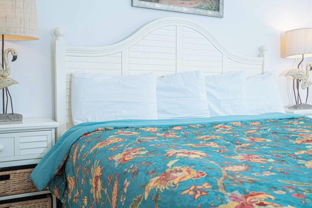 Sun Kissed Beachside Condo With Pool