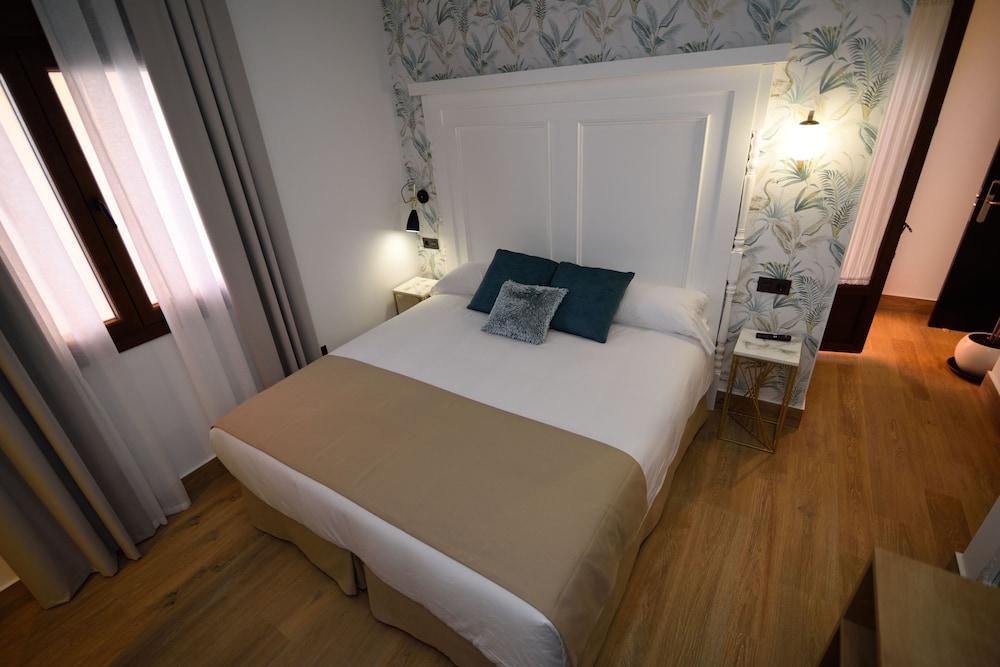 Hostal Santa Habitaciones