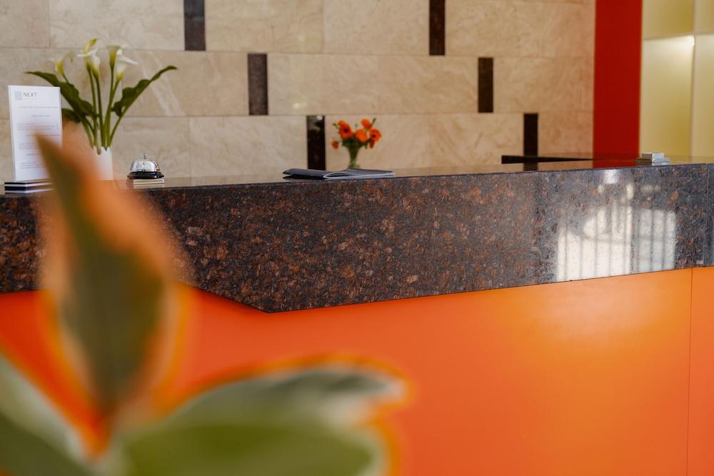 Next Orange Aparthotel Official