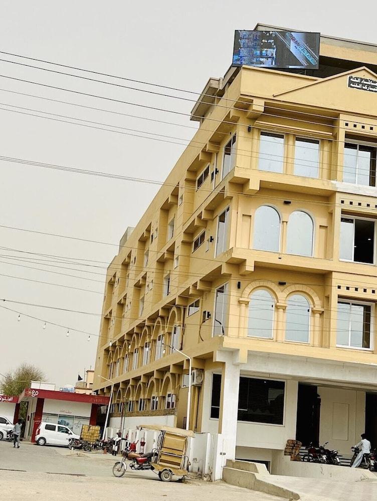 OVERSEAS HOTEL AND SUITES