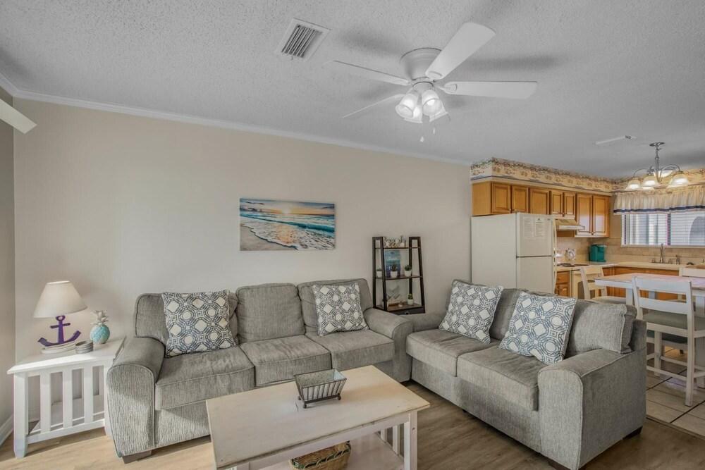 Pleasant Condo With Pool and Walk to Beach