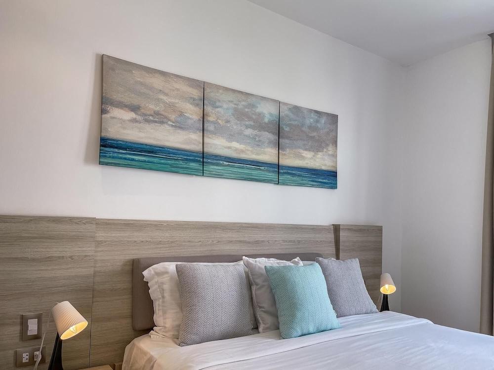 Affordable Luxury Condo Steps Away From the Beach