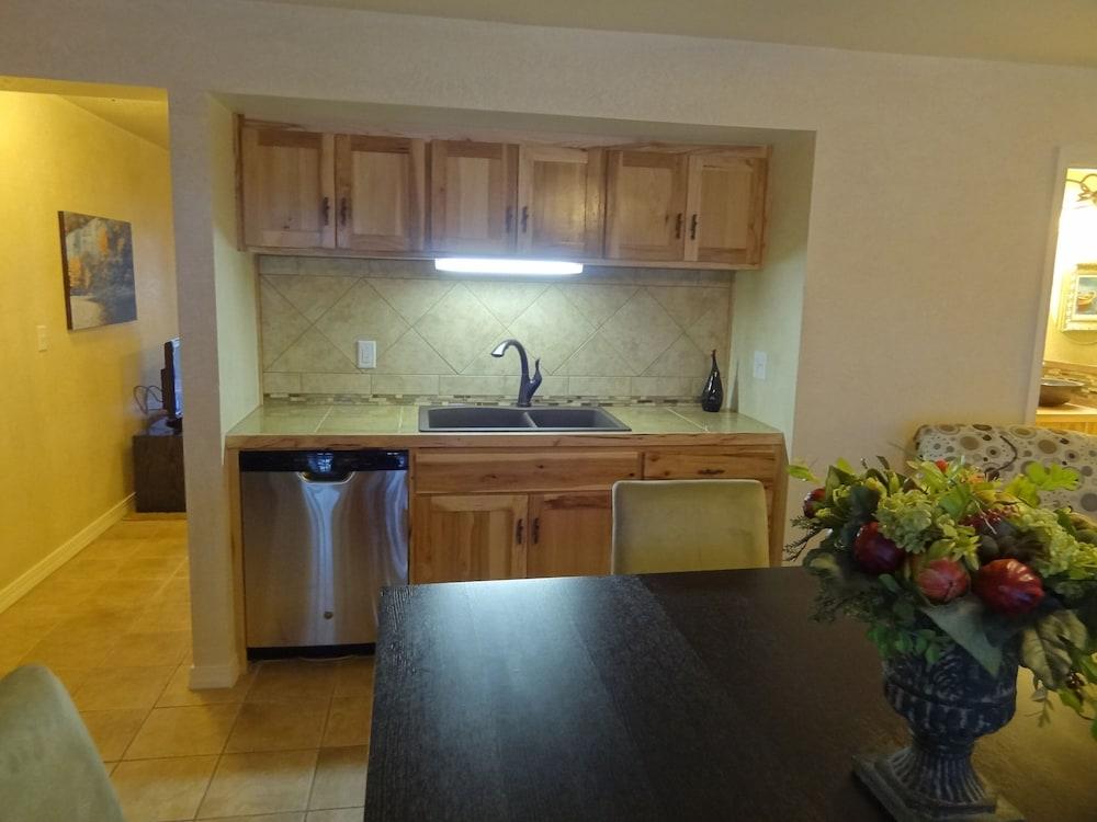 Poolside King Cabana with full kitchen, king bed, sleeper sofa and pool access. by RedAwning