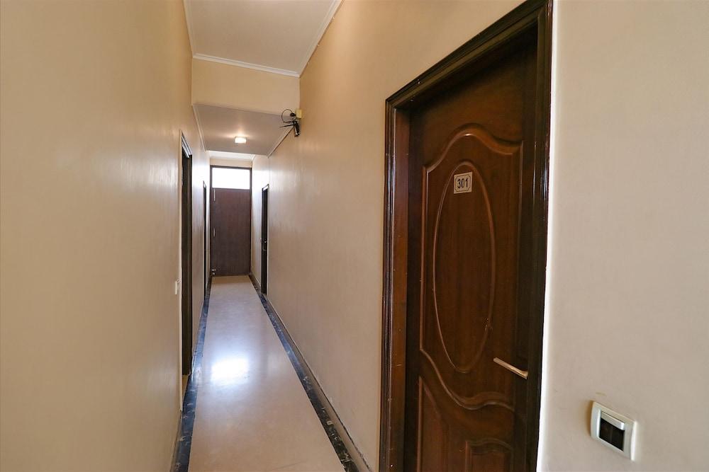 FabHotel Happy Residency