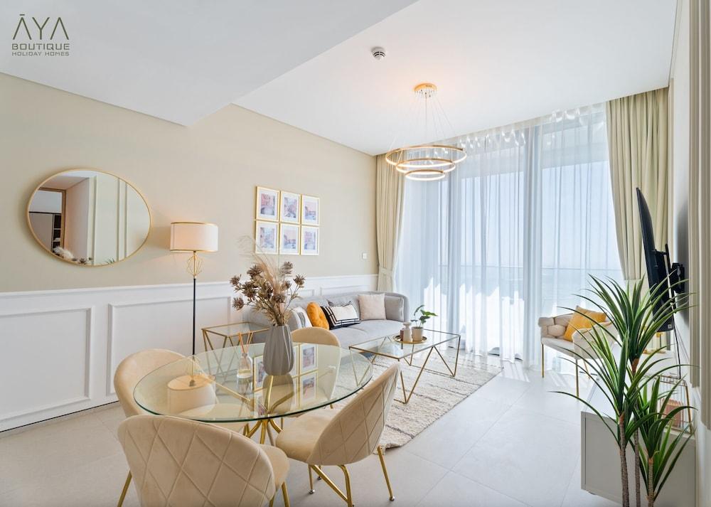 Aya - Canal View From this 1BR in Jumeirah Gate Tower 1