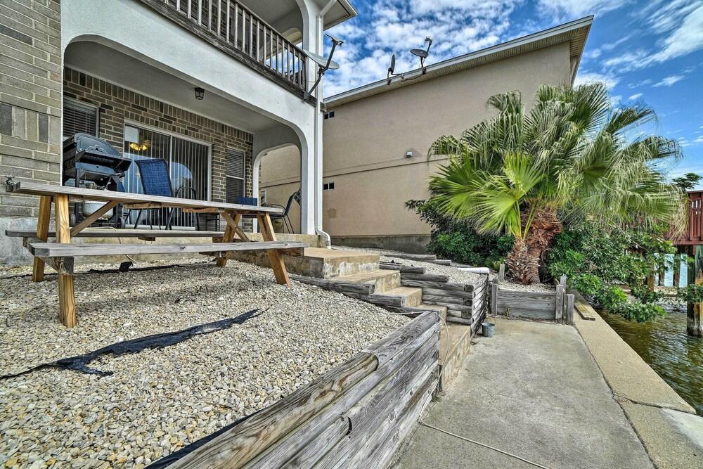 Modest Canalfront Condo w/ Dock < 2 Mi to Beaches!