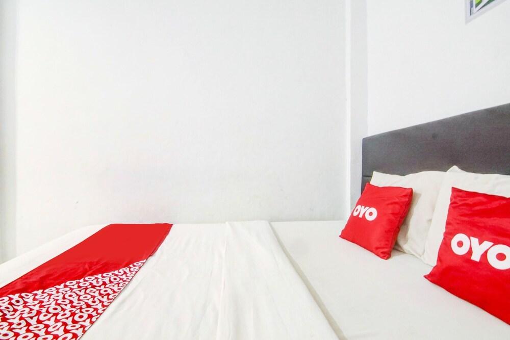 OYO 90310 Cosmo Harmoni