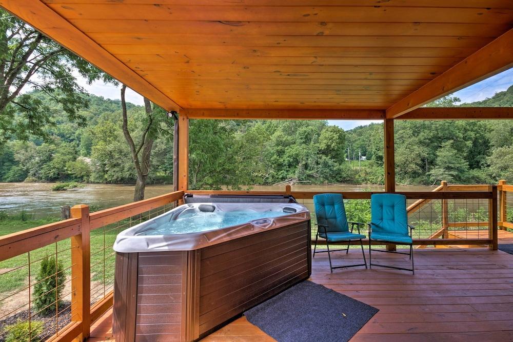 Deck & Hot Tub: Bryson City Riverfront Cabin!