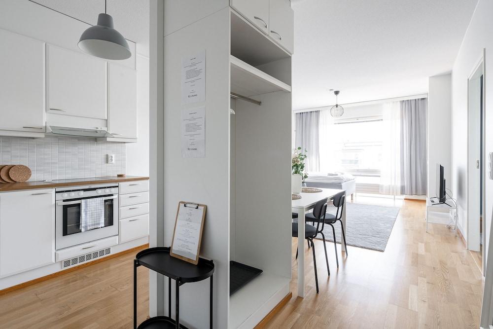 Top Floor 1BR Home with Parking, Sauna and Balcony