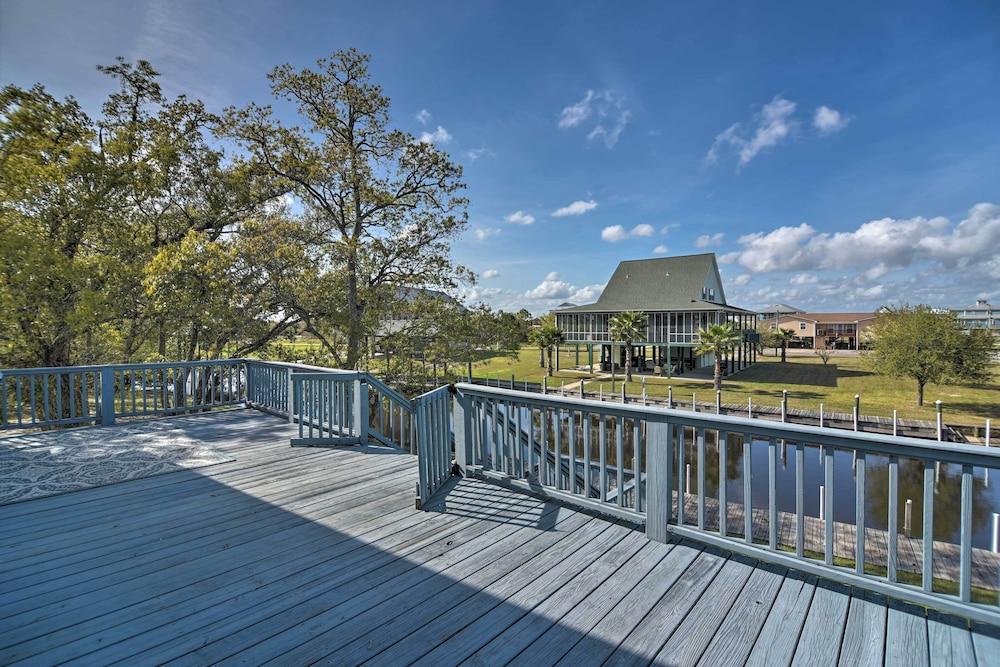 Fish at Canalfront Bay St Louis Home - Dock & Deck