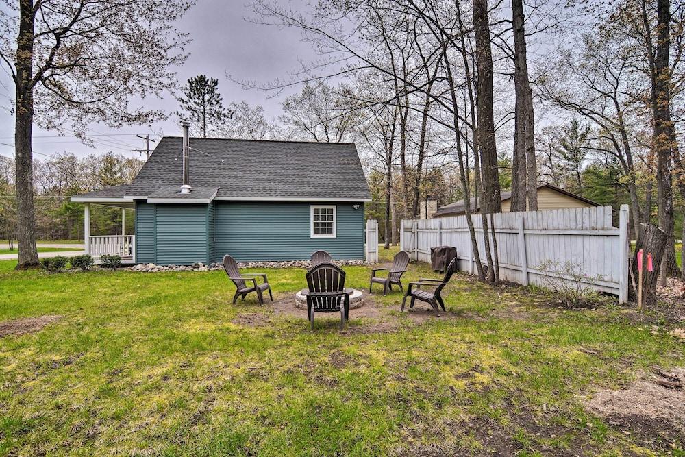 Higgins Lake Area Cabin w/ Fire Pit & Yard!