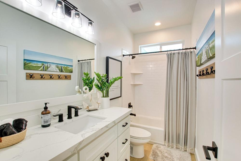 Pool Access & Lake Views: Modern Garden City Home